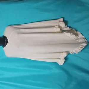 AVENUE Off White Poncho With Ruffle Bottom. One Size.